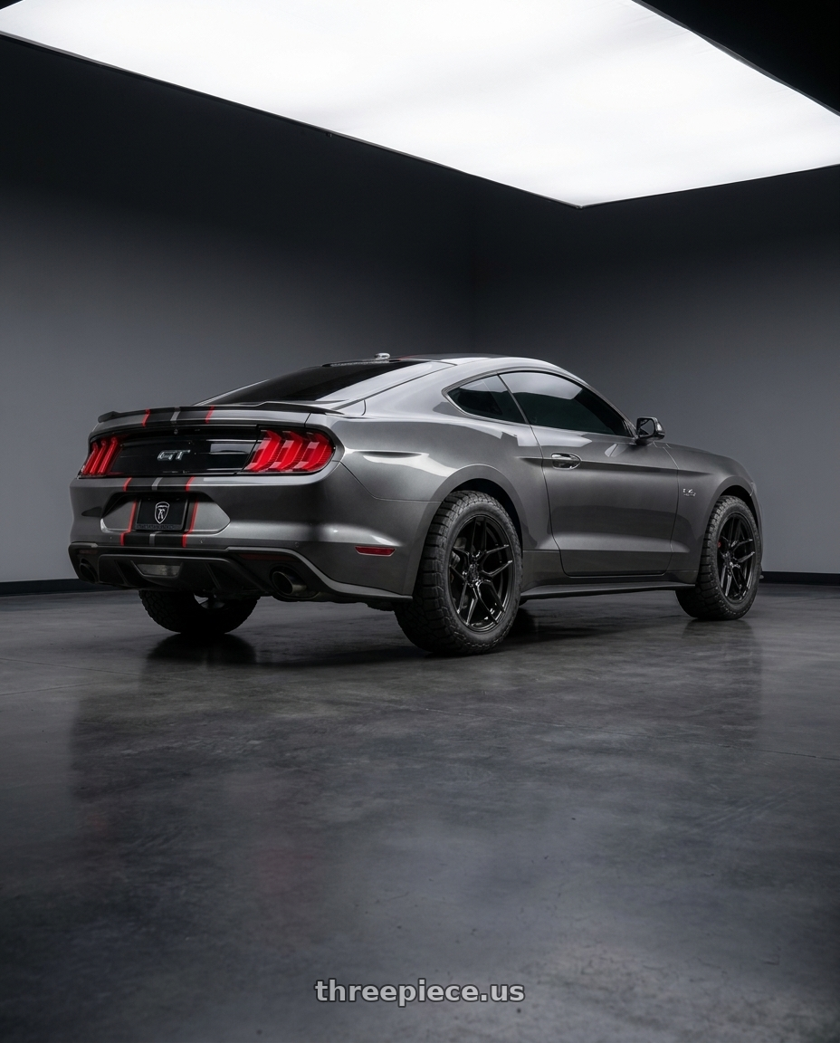 2017 Ford Mustang GT with Rohana RFX11 5x114.3 19x9.5+40 Gloss Black wheels rear three quarter view meaty tires
