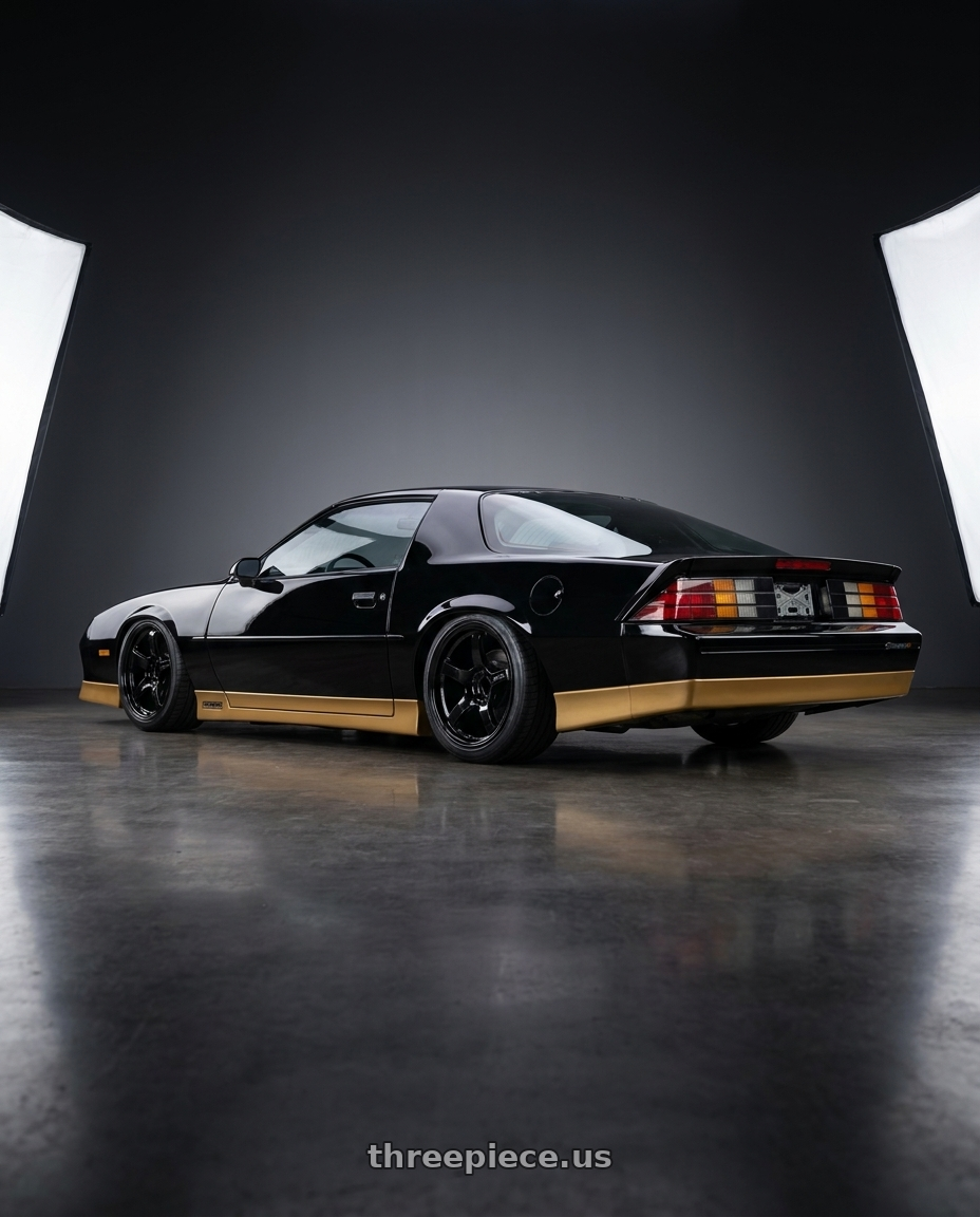 1988 Chevy Camaro with Gram Lights 57CR 4x100 17x7 +40 Gloss Black wheels rear three quarter view slight stretch tires