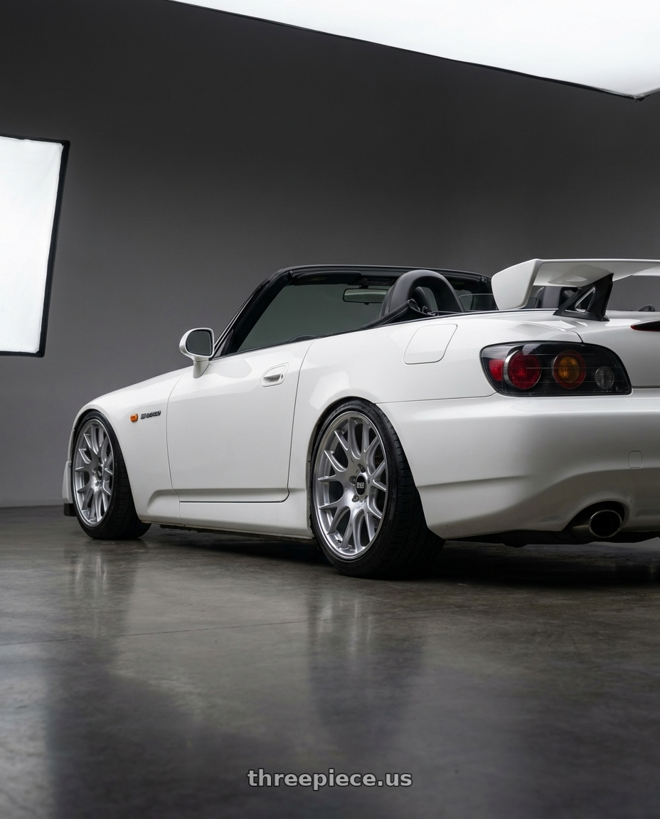2009 S2000 ap2 type s with BBS CH-R 5x120 18x9 +44 Brilliant Silver Polished Rim Protector wheels rear three quarter view slight stretch tires