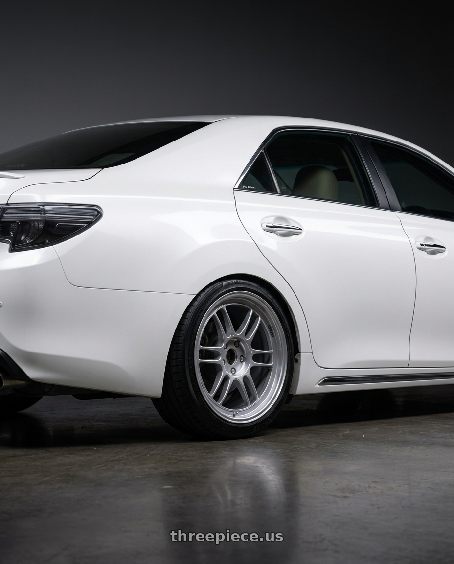 2014 Toyota Mark X with Enkei RPF1 5x114.3 18x8.5+30 Silver wheels rear three quarter view square tires
