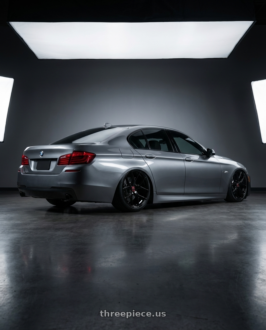 2016 BMW 5 Series F10 with Vossen HF-5 20x9 / 5x120 / ET35 / Flat Face / 72.56 - Gloss Black Wheel - HF5-0B01 wheels rear three quarter view slight stretch tires