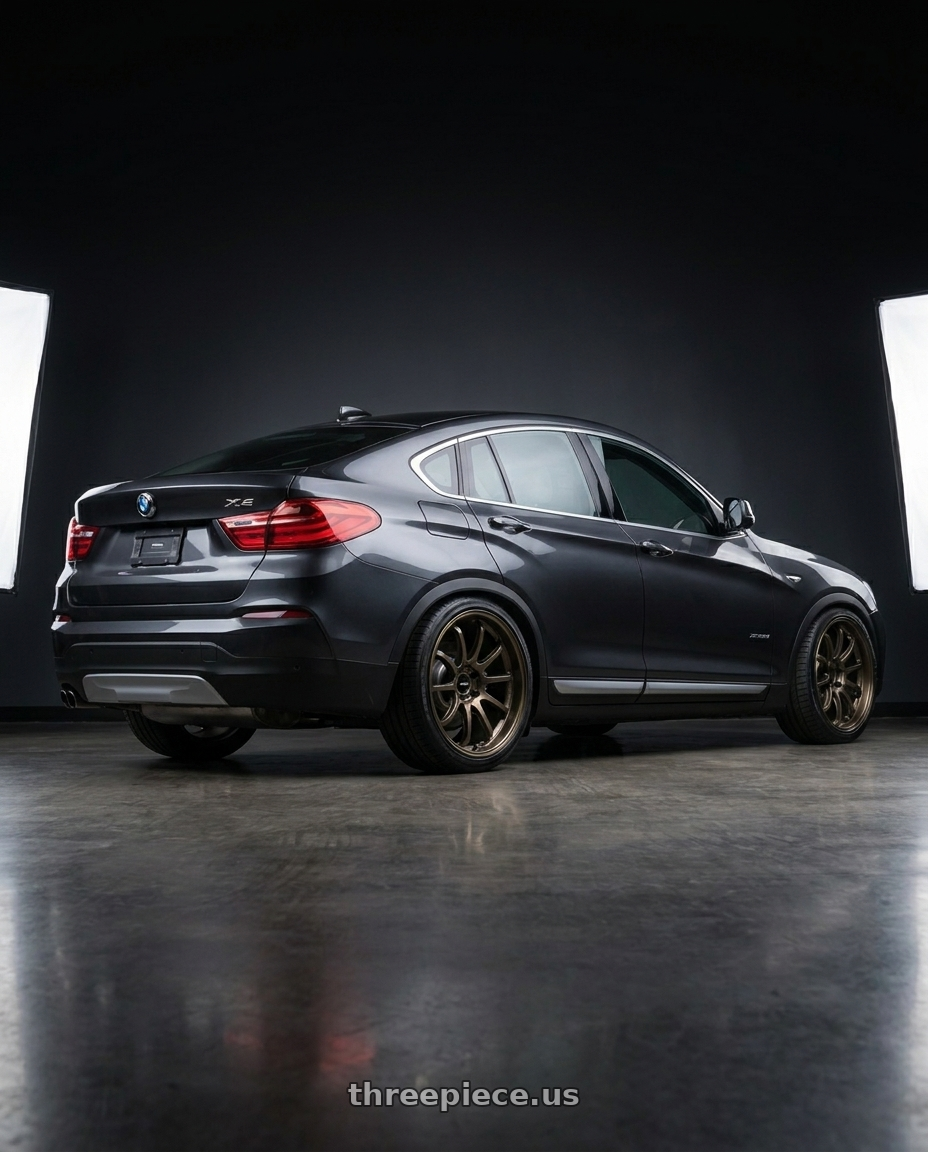 2016 Bmw x4 with Advan Racing RS-DF Progressive 5x120 19x10+35 Dark Bronze Metallic wheels rear three quarter view slight stretch tires