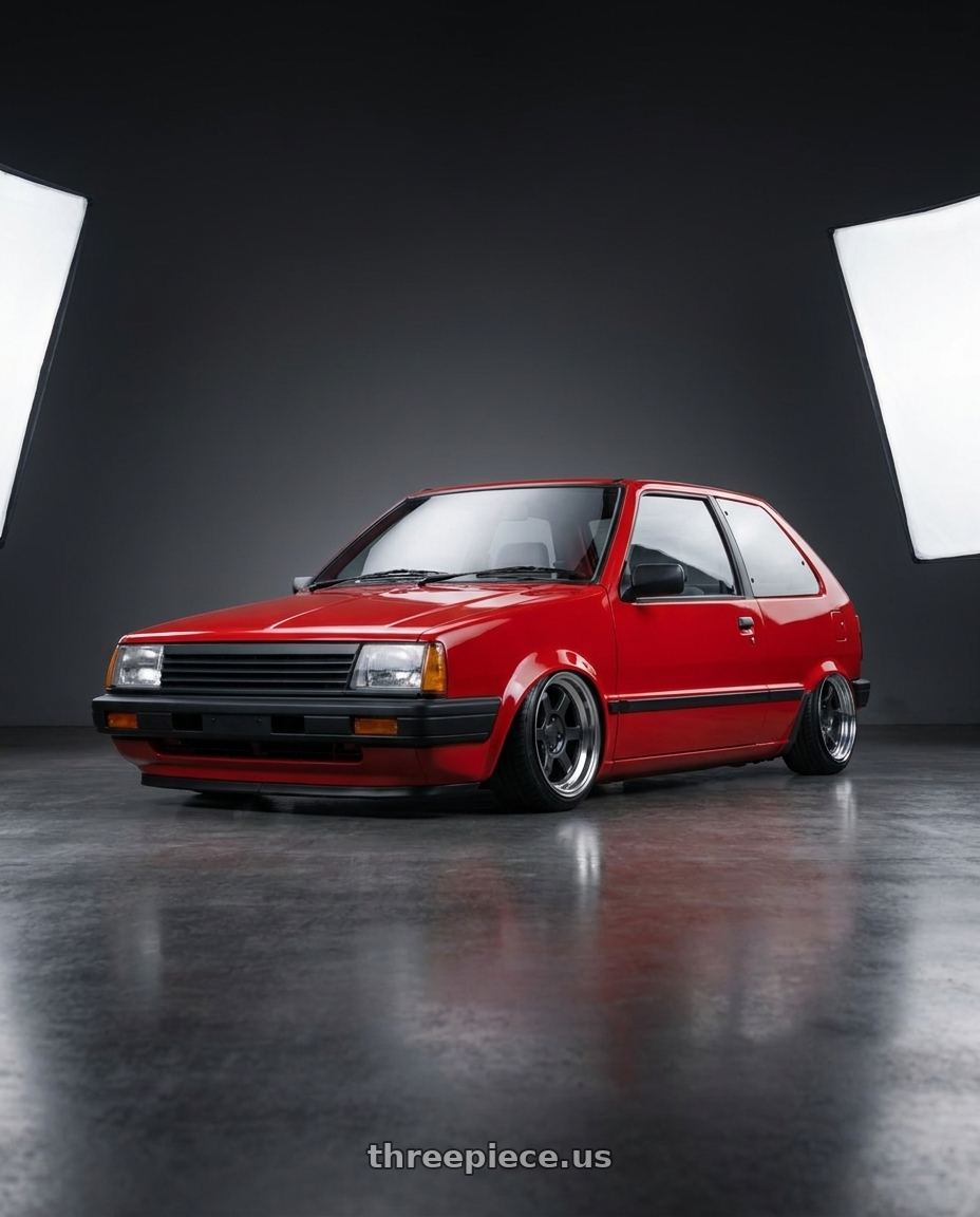 1982 Nissan Micra with 9six9 SIX-1 Deep 4x100 15X8 +20 Carbon Gray / Machined Lip wheels