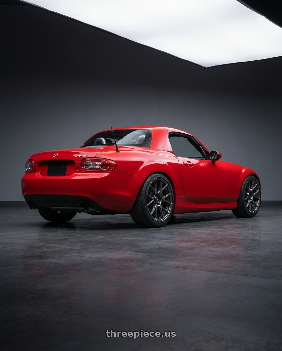 2012 Mazda MX-5 Miata NC with Konig Ampliform 5x114.3 17x9+40 Dark Metallic Graphite wheels rear three quarter view square tires