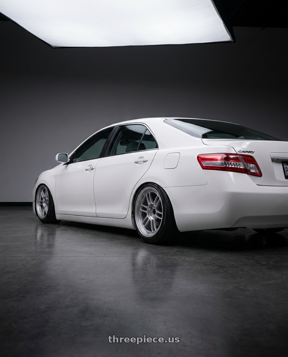 2011 Toyota camry white with Enkei RPF1 5x114.3 18x8.5+40 Silver wheels rear three quarter view slight stretch tires