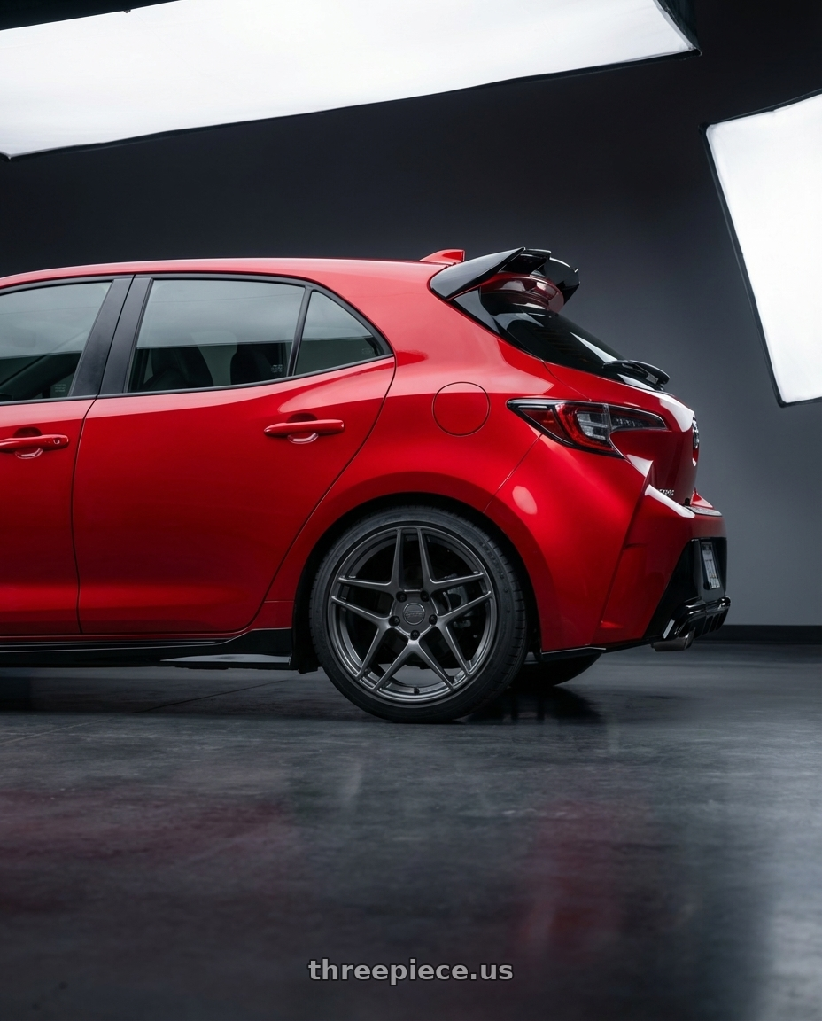 2021 toyota corolla hatchback, se, special edition, supersonic red with Kansei K15G Astro 5X100 18x9 22 Gunmetal wheels rear three quarter view square tires