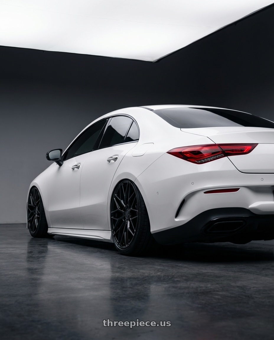 2023 Mercedes-Benz CLA C118 with Avant Garde Wheels M520R 5X112 19x9.5 +40 Gloss Black wheels rear three quarter view slight stretch tires