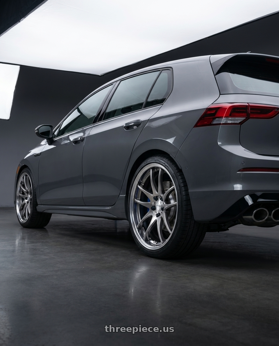2026 Volkswagen Golf R Graphite with Work Cr 2P 5x112 18x8.5 +45 GT Silver wheels rear three quarter view square tires