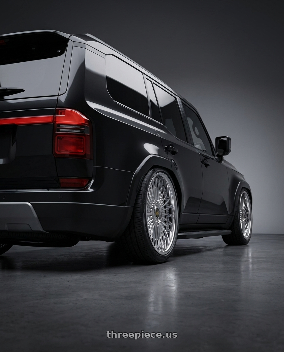 2026 lexus gx with Work Emitz wheels rear three quarter view slight stretch tires