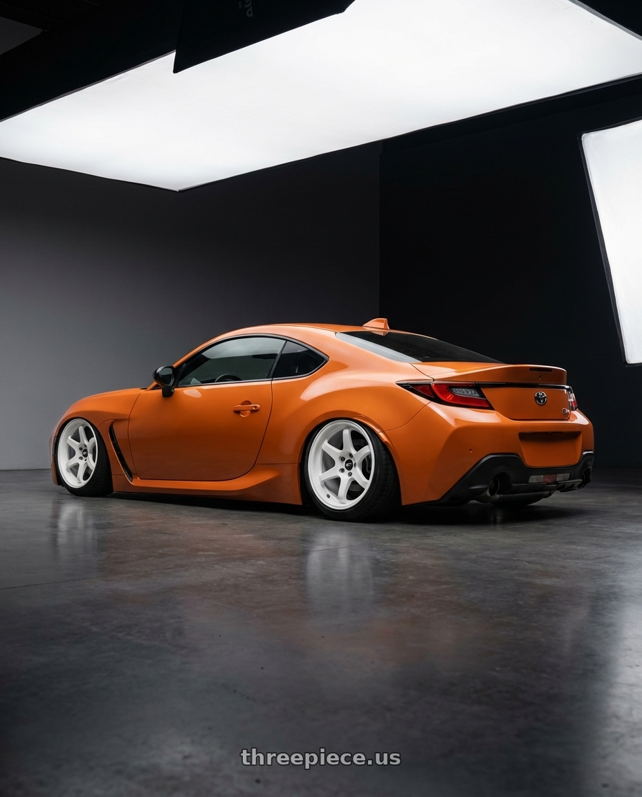 2023 gr86 10th anniversary  with MST Wheels DELTA 5x114.3 18x9.5 +38 Alabaster White wheels rear three quarter view slight stretch tires