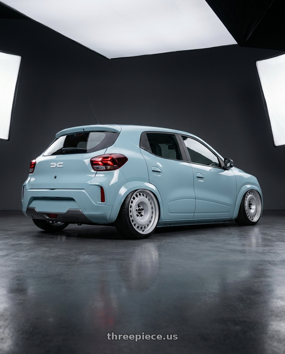 2026 Renault Dacia Spring with Rotiform 198 5x120 20x8.5 +35 MATTE SILVER wheels rear three quarter view extreme stretch tires