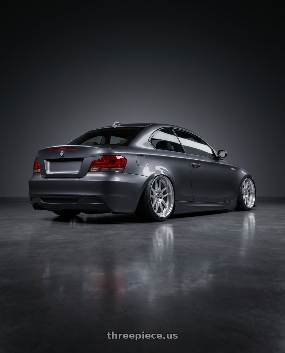 2012 BMW 1 Series E82 with ESR Wheels APEX SERIES AP8 5x120 18x9.5 +22 Hyper Silver wheels rear three quarter view slight stretch tires