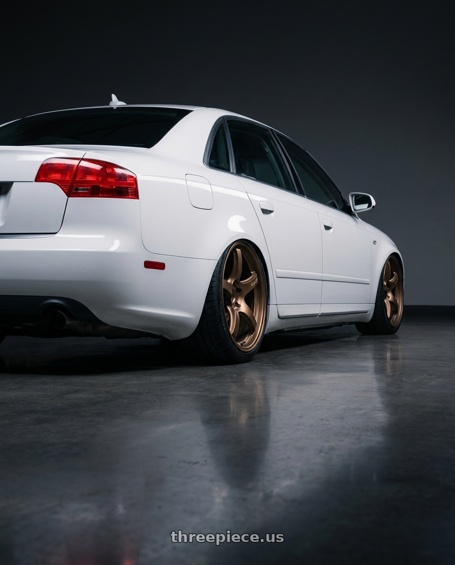 2010 Audi A4 B7 with Gram Lights 57CR 5x112 19x9.5+25 Bronze II wheels rear three quarter view slight stretch tires