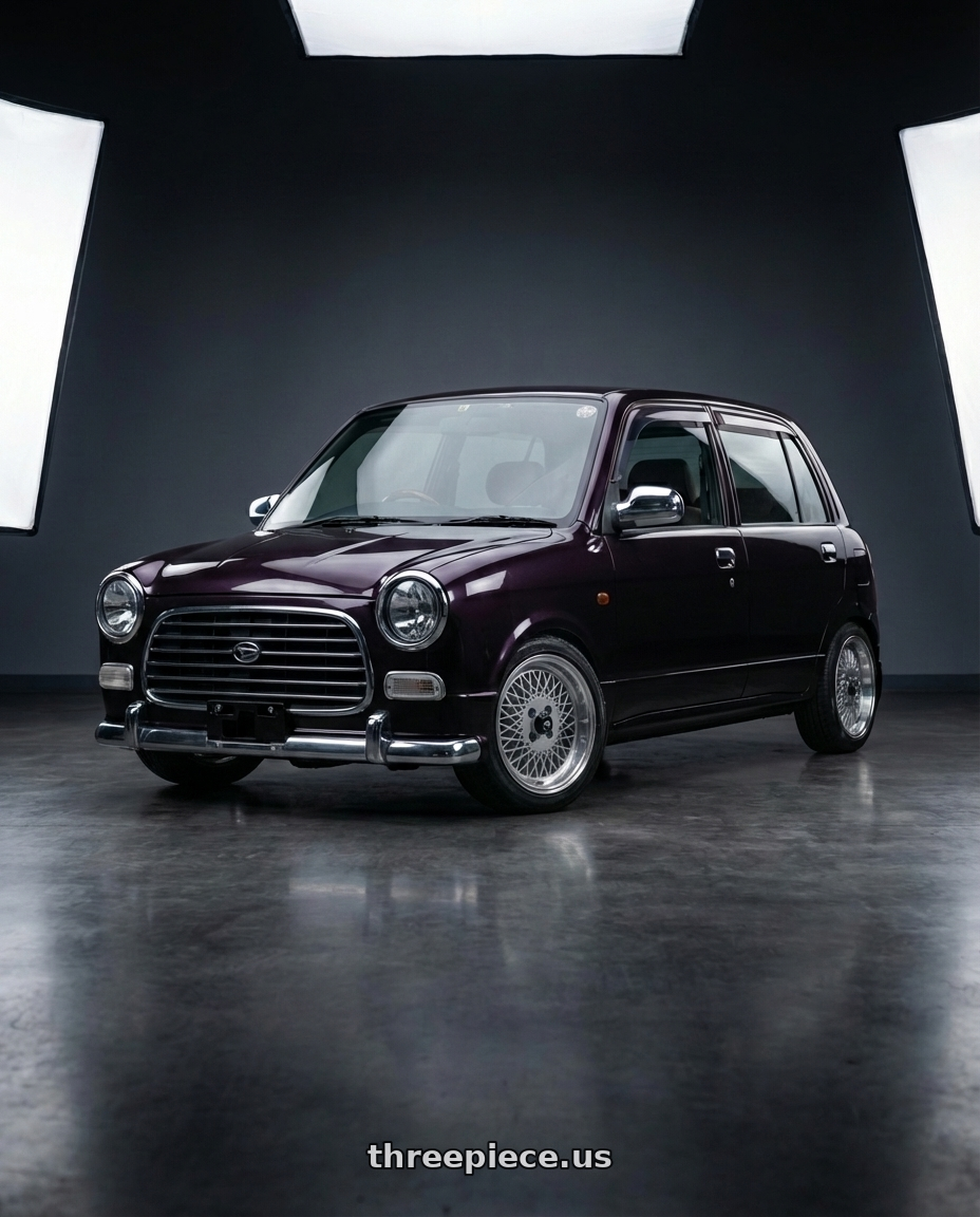 2000 Daihatsu Mira Gino  with Enkei Enkei92 Classic Line 4x100 15x7+38 Silver wheels