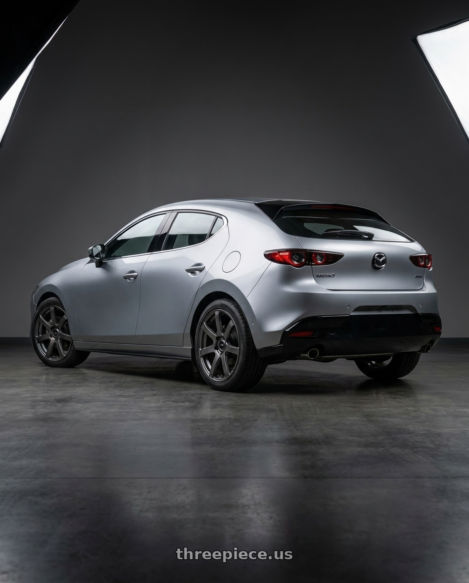 2022 mazda 3 with Enkei PF07 5x114.3 19x8+45 Dark Silver wheels rear three quarter view square tires