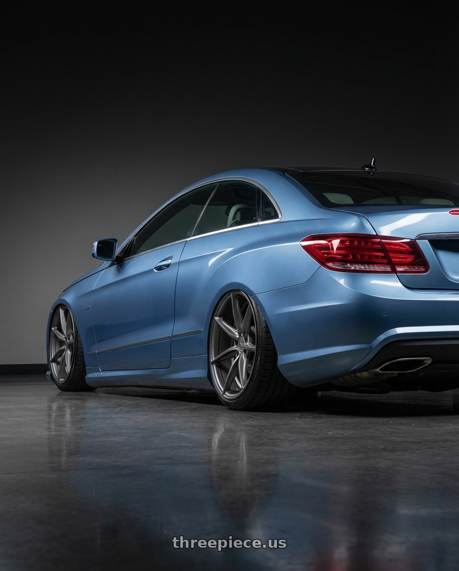 2014 Mercedes-Benz E-Class Coupe C207 with Niche 1PC M116 MISANO 5X112 20X9 +38 MATTE GUN METAL wheels rear three quarter view slight stretch tires