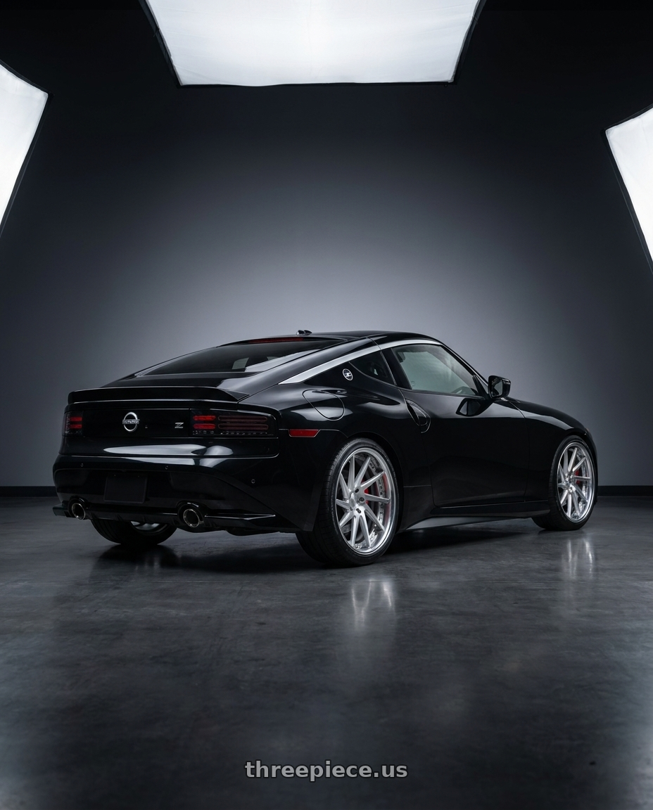 2025 Nissan Z with Work Gnosis Cvs 5x114.3 19x9+12 W Disk Matte Silver wheels rear three quarter view slight stretch tires