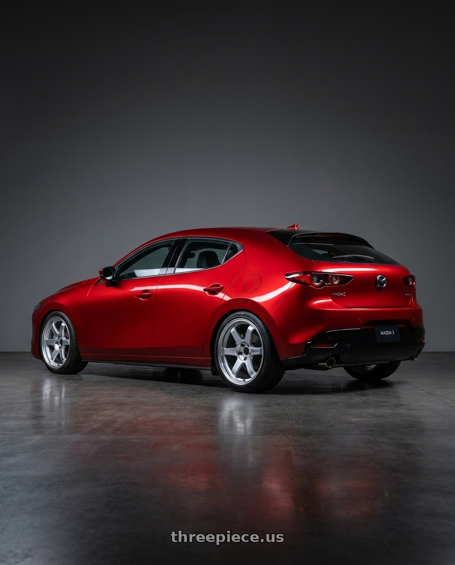 2024 Mazda 3 with Volk Racing TE37 ULTRA M-SPEC 5x114.3 19x9.5 +22 DIAMOND SILVER wheels rear three quarter view slight stretch tires