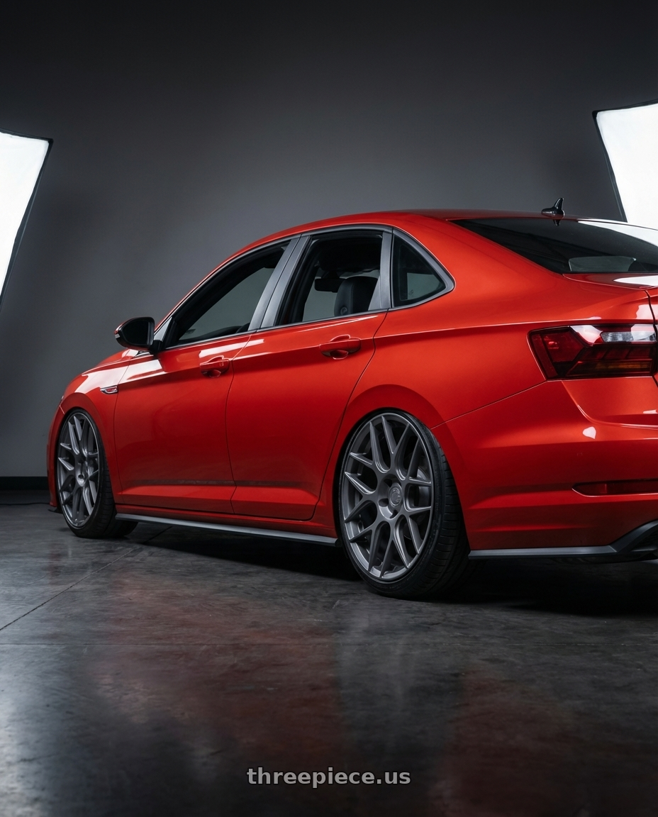 2023 Volkswagen Jetta GLI MK7 with Aodhan AFF2 5x112 19x8.5+35 Matte Gray wheels rear three quarter view slight stretch tires