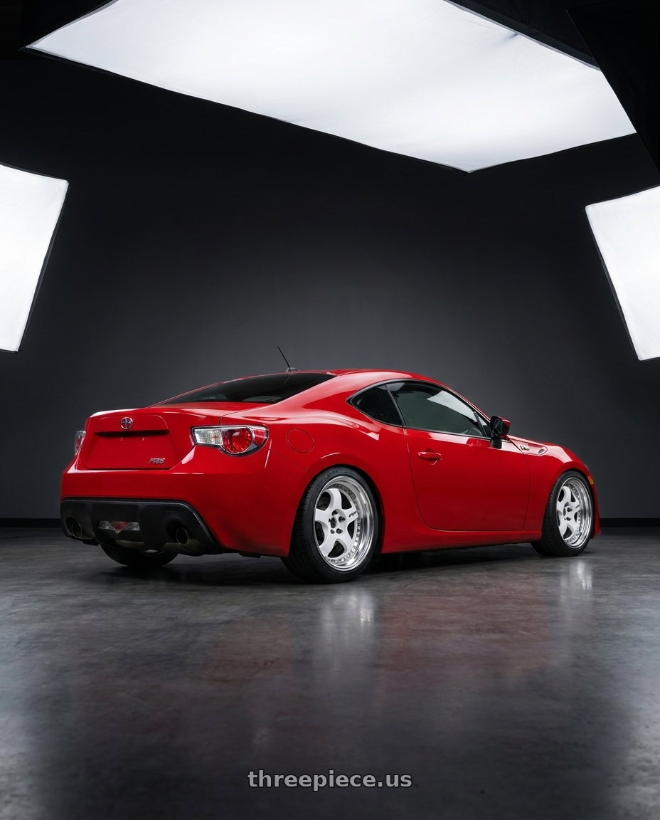 2013 Scion FRS with Work Meister S1 3P 5x100 17x7.5+42 W Disk White wheels rear three quarter view square tires
