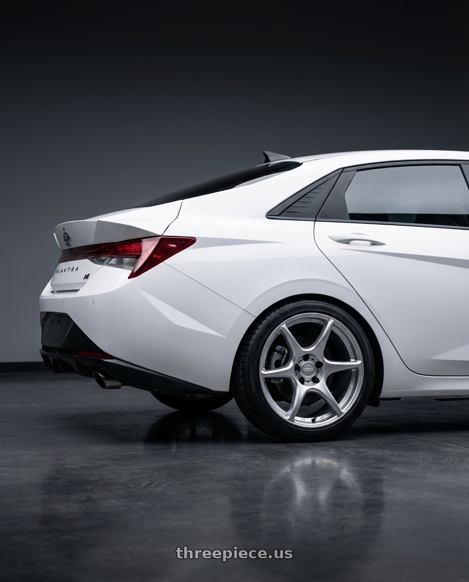 2024 Hyundai Elantra N with Kansei K11S Tandem 5x114.3 19x10.5 12 Hyper Silver wheels rear three quarter view square tires