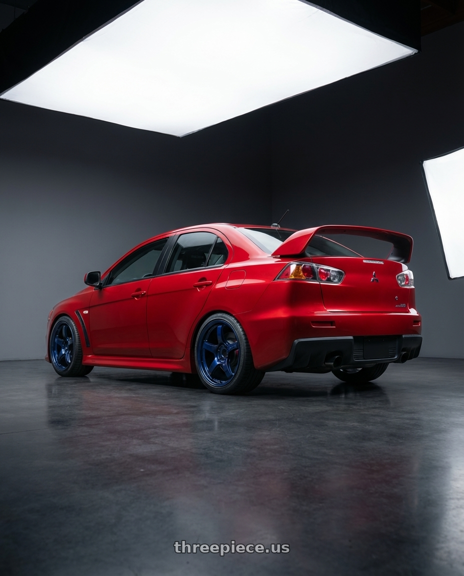 2012 Mitsubishi Lancer Evo X with Gram Lights 57CR 5x114.3 18x9.5+22 Eternal Blue Pearl wheels rear three quarter view square tires