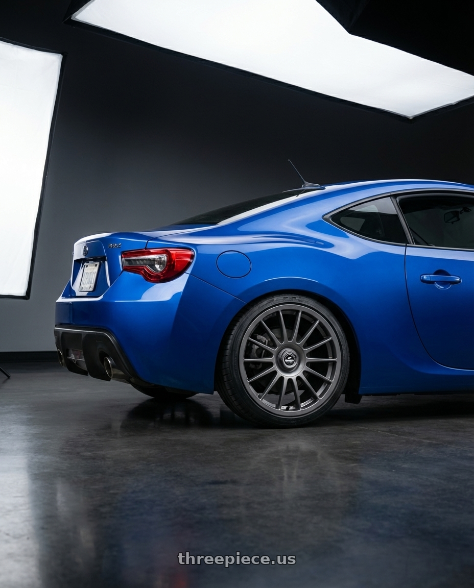 2017 Subaru BRZ with fifteen52 PODIUM 5x100 / 5x112 17x7.5 +35 FROSTED GRAPHITE (SATIN GREY) wheels rear three quarter view square tires