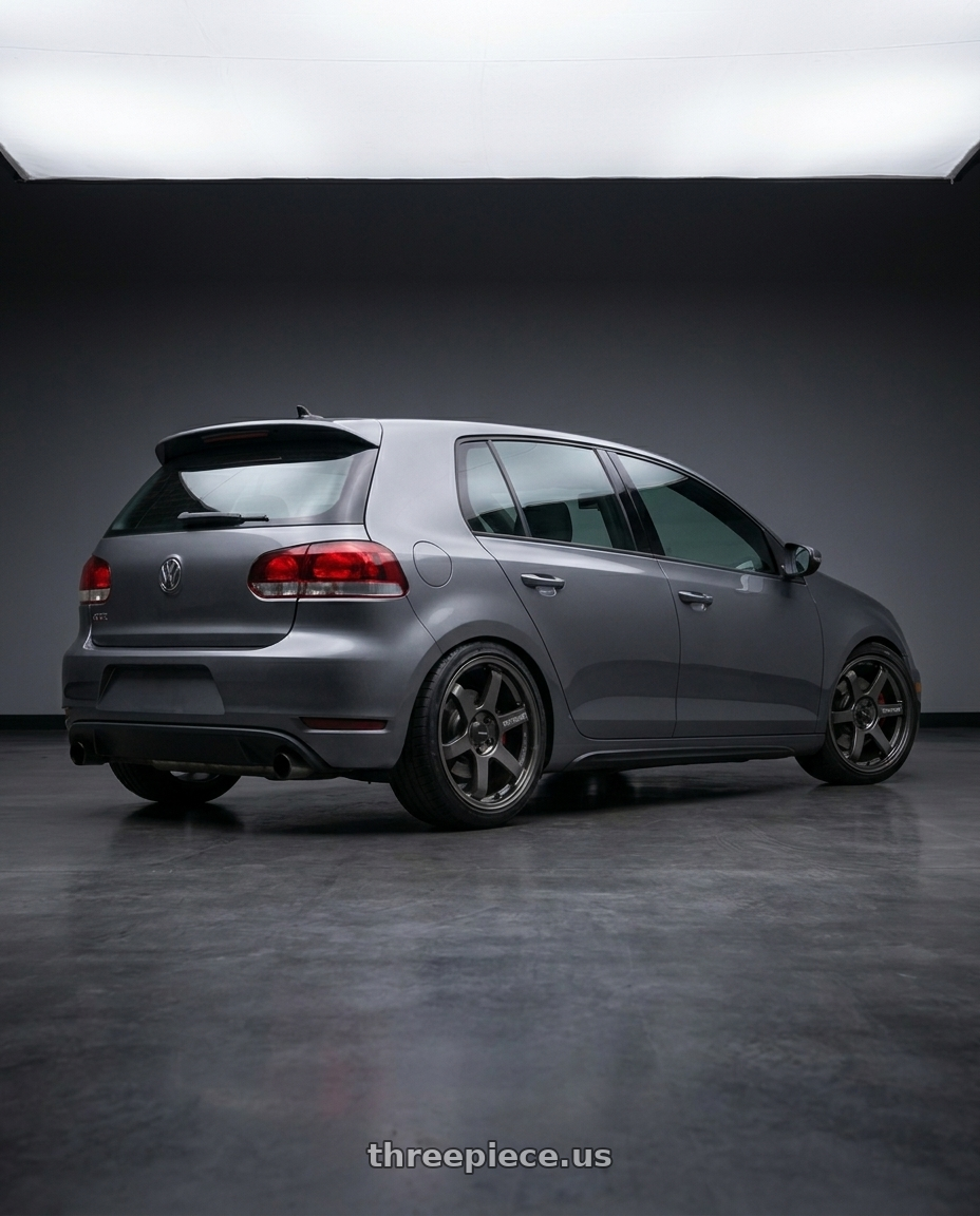 2012 vw gti with Konig Hypergram 5x112 18x8.5+43 Matte Grey wheels rear three quarter view slight stretch tires