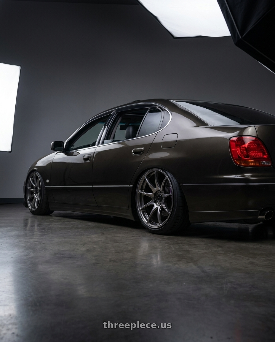 2000 Lexus Gs300 with Vors TR4 5x114.3 18x8.5  +35 Hyper Black wheels rear three quarter view square tires