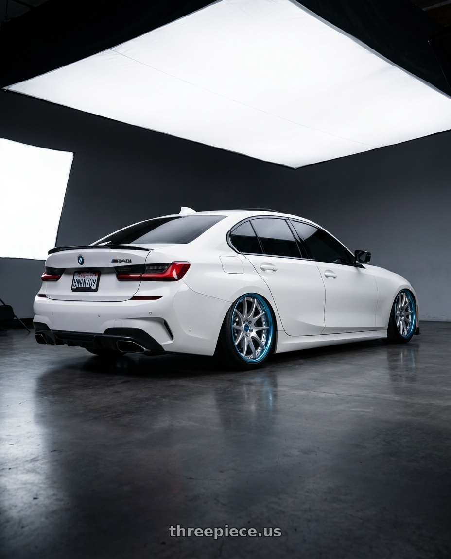 2021 bmw m340i with Work Emotion CR 3P wheels rear three quarter view square tires