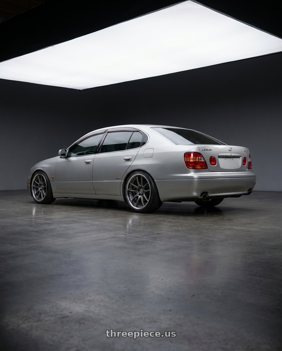 2001 Lexus gs300 with Work Emotion Cr 3P 5x114.3 18x9.5+35 A Disk Matte Gunmetal wheels rear three quarter view square tires