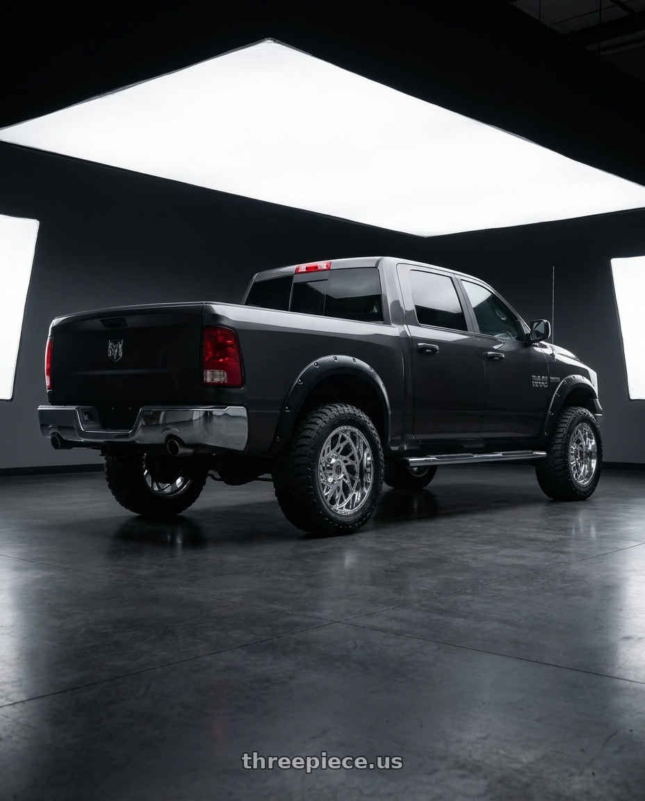 2018 ram 1500 tradesman  with American Truxx Destiny AT1913 5x139.7 20x10-24 Chrome wheels rear three quarter view meaty tires