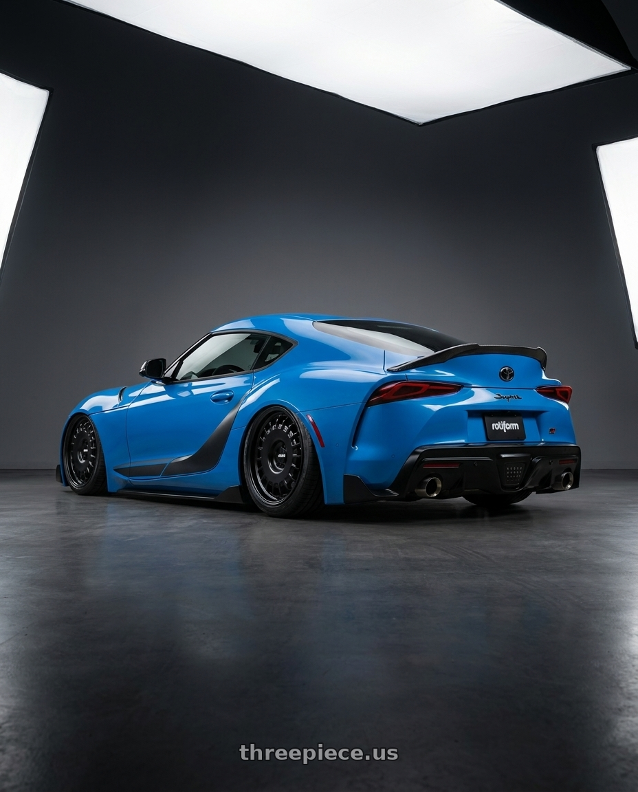 2021 Toyota gr supra a91 edition with Rotiform RC205 PMF 5X108 19x8.5 +45 MATTE BLACK wheels rear three quarter view slight stretch tires