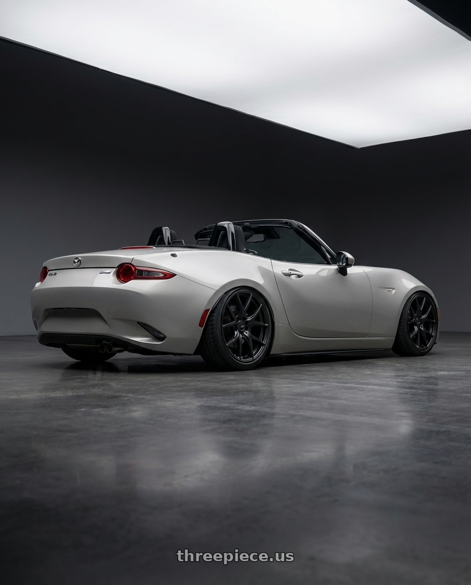 2021 Mazda MX-5 Miata ND with Ssr Gtv03 5x114.3 17x7+42  FLAT BLACK wheels rear three quarter view slight stretch tires