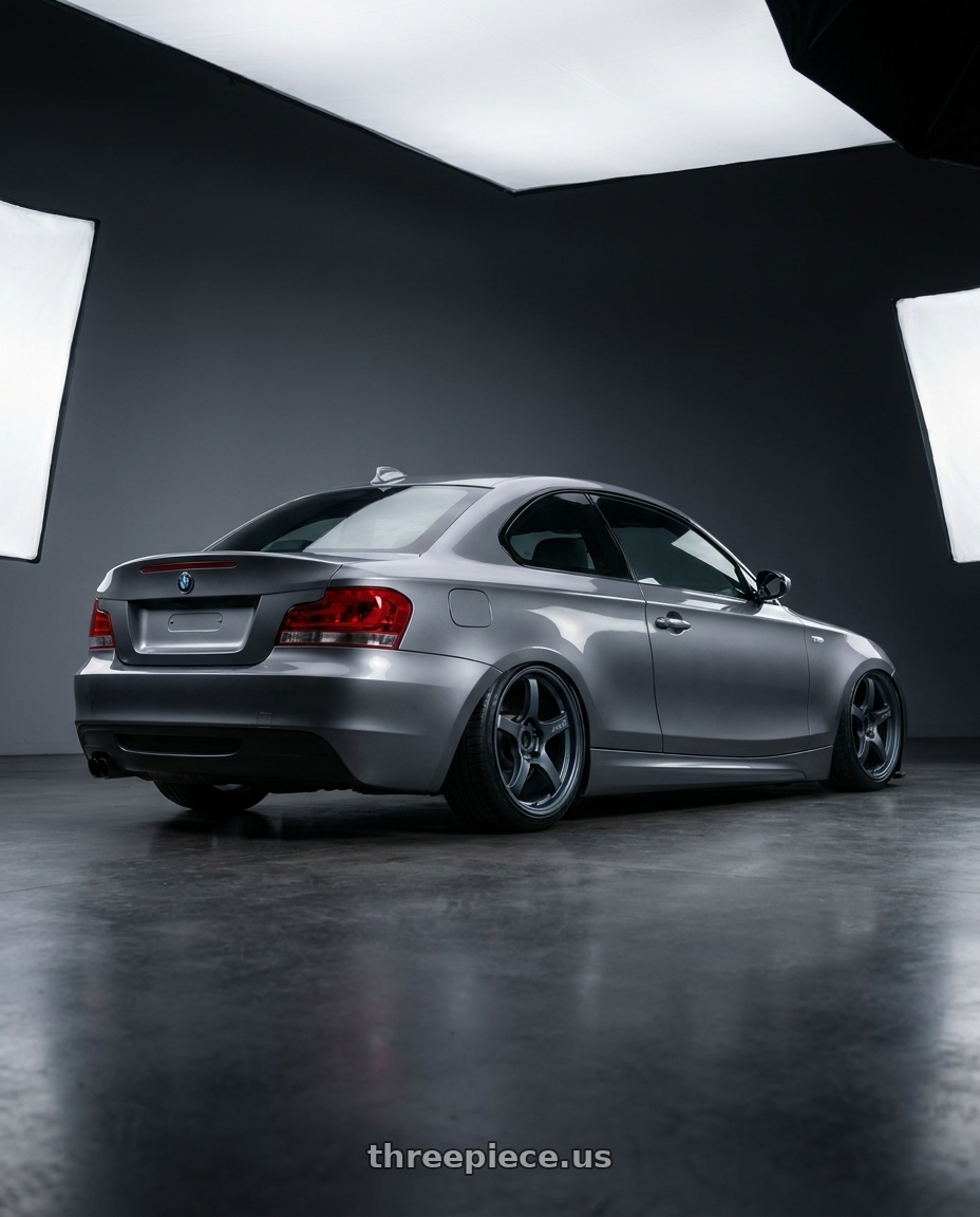 2012 BMW 1 Series E82 with Gram Lights 57CR 5x120 19x8.5+35 Gunblue II wheels rear three quarter view slight stretch tires