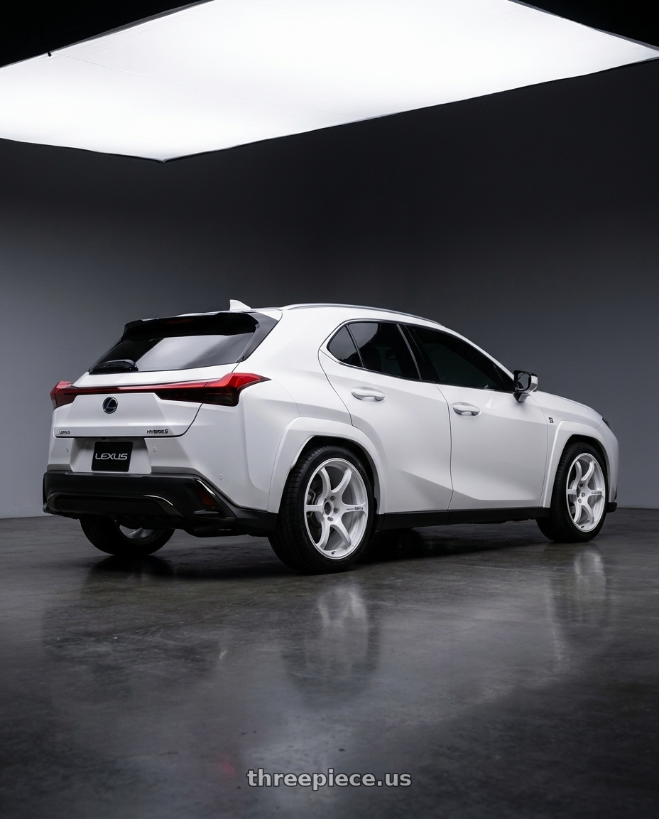 2025 Lexus UX with Advan Racing RG-4 5x114.3 18x9.0 +25 RACING WHITE METALLIC & RING wheels rear three quarter view square tires