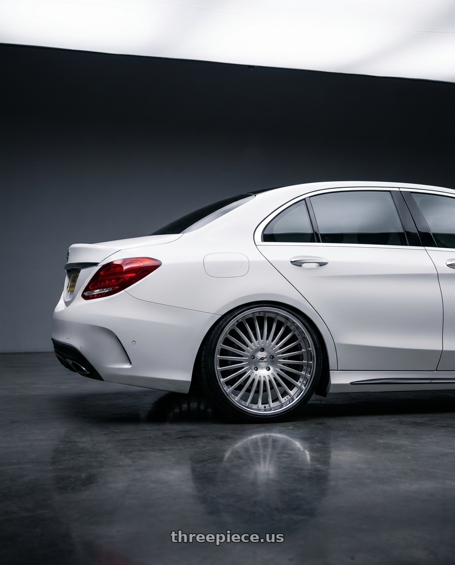 2014 W205 C250 with Amani R.E.A.L. 5x112/5x120 22x10 +38 Brush Center Chrome Lip wheels rear three quarter view square tires