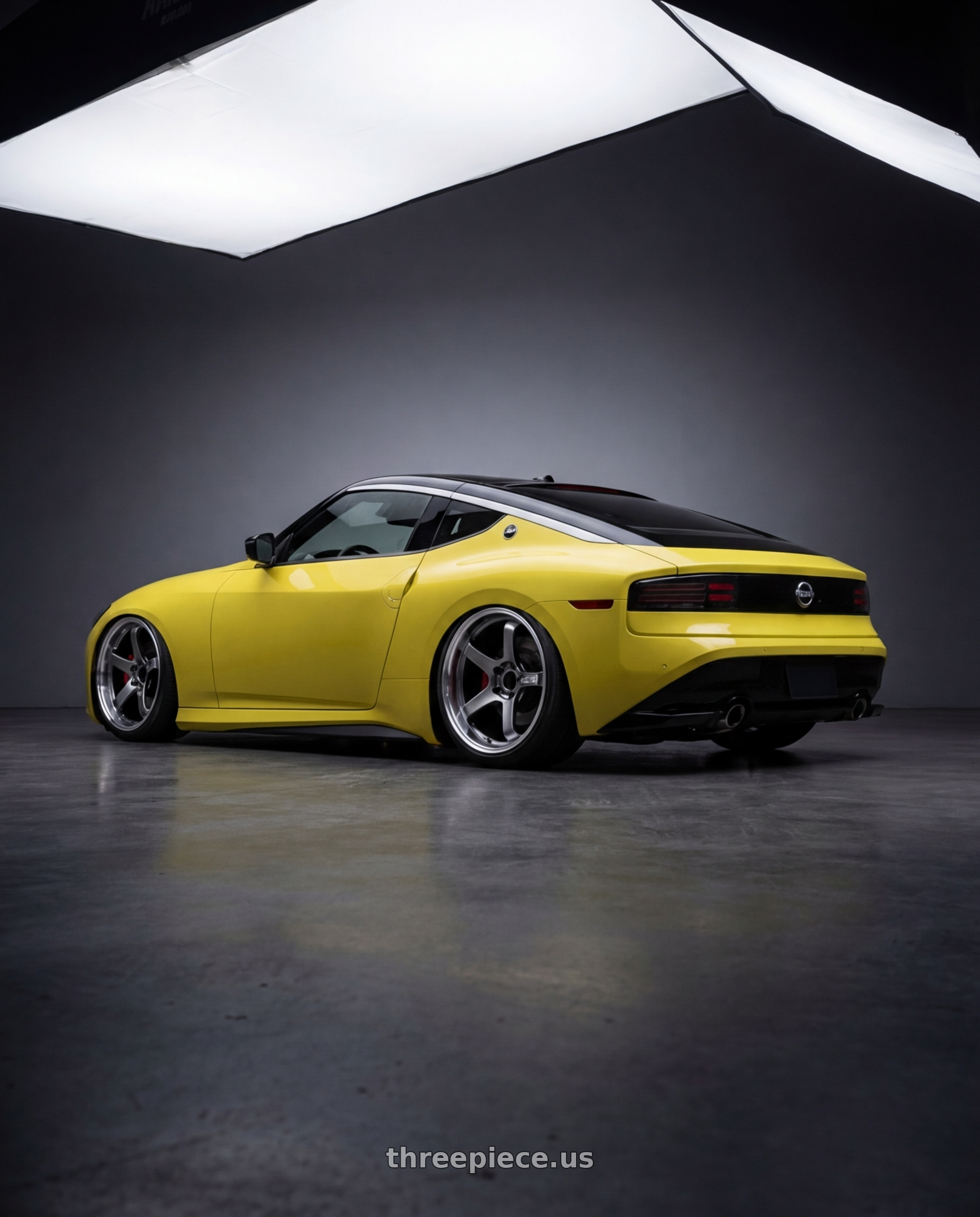 2024 Nissan Z with Advan Racing GT BEYOND 5x114.3 19x10.5 +24 MACHINING & HYPER PLATINUM BLACK wheels rear three quarter view slight stretch tires