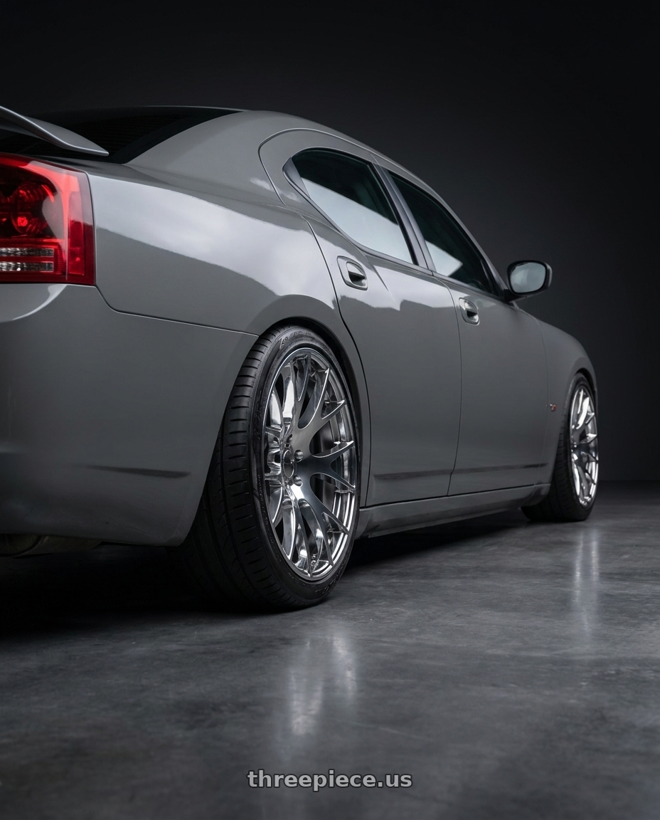 2006 dodge charger rt with REPLICA 218 5X115 22x11 +27 CHROME STG ONLY wheels rear three quarter view extreme stretch tires