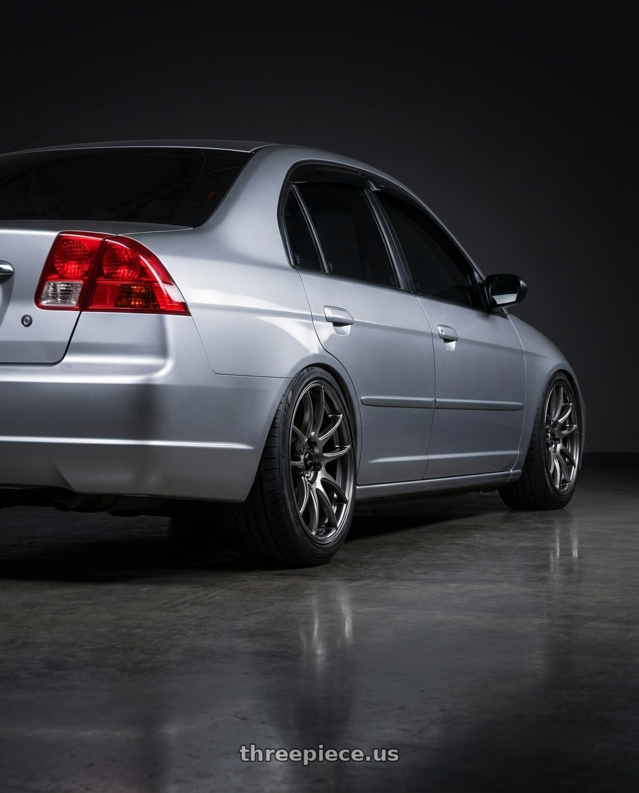 2002 Honda civic with Vors TR4 5x100 17x8  +35 Hyper Black wheels rear three quarter view square tires