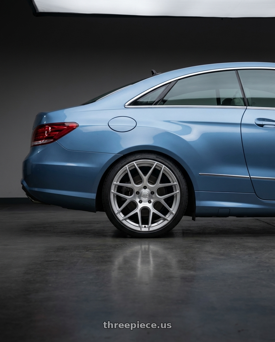 2014 Mercedes-Benz E-Class Coupe C207 with Aodhan AFF2 5x112 19x9.5+35 Gloss Silver Machined Face wheels rear three quarter view square tires