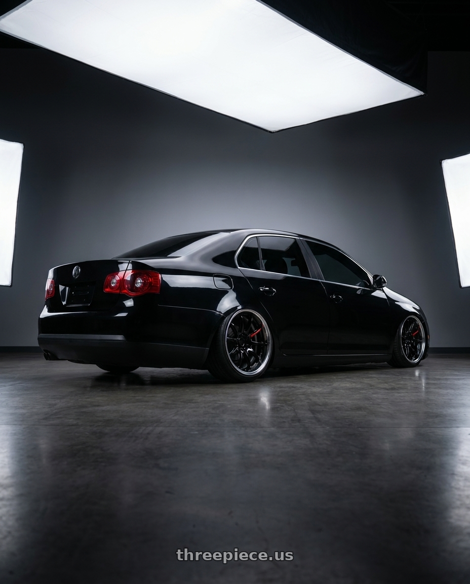 2007 Vw Jetta 2.0t with Work Zr10 2P 5x112 18x8.5 +45 Black wheels rear three quarter view slight stretch tires
