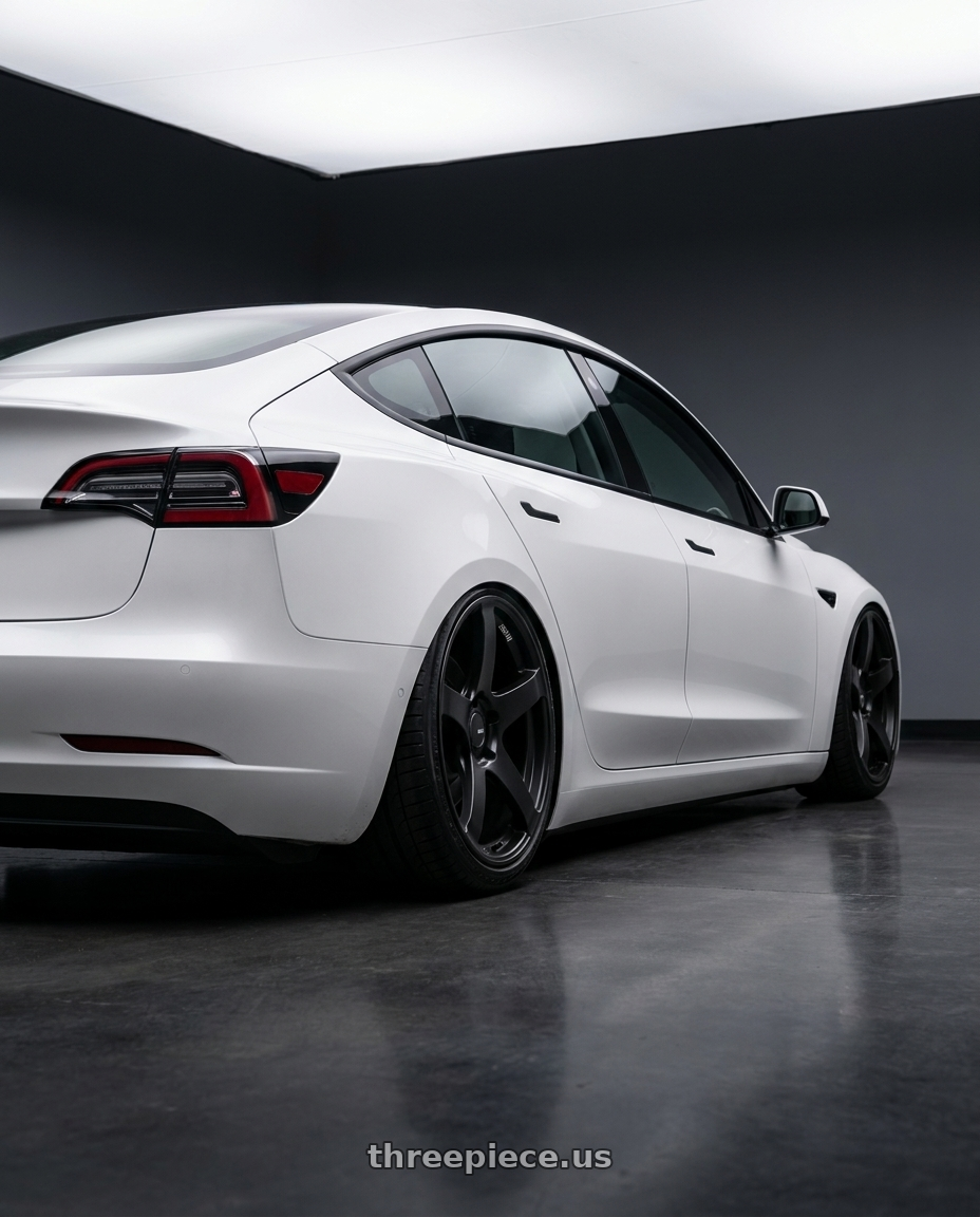 2023 Tesla Model 3 with Ssr Gtv01 5x114.3 19x8.5+38  FLAT BLACK wheels rear three quarter view slight stretch tires