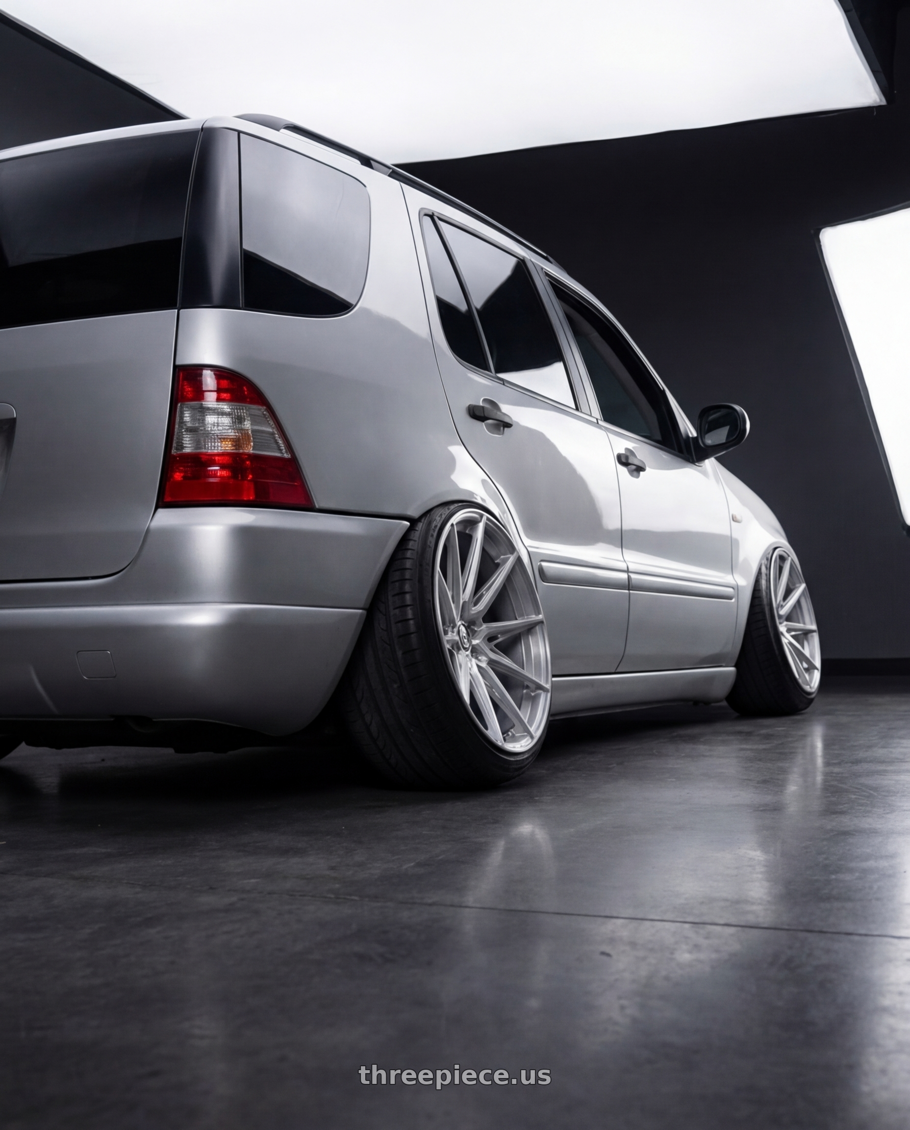 2000 Mercedes Benz ML350 with Brada Wheels CX2 5x112 19x10 +30 Brushed Hyper Silver wheels rear three quarter view slight stretch tires