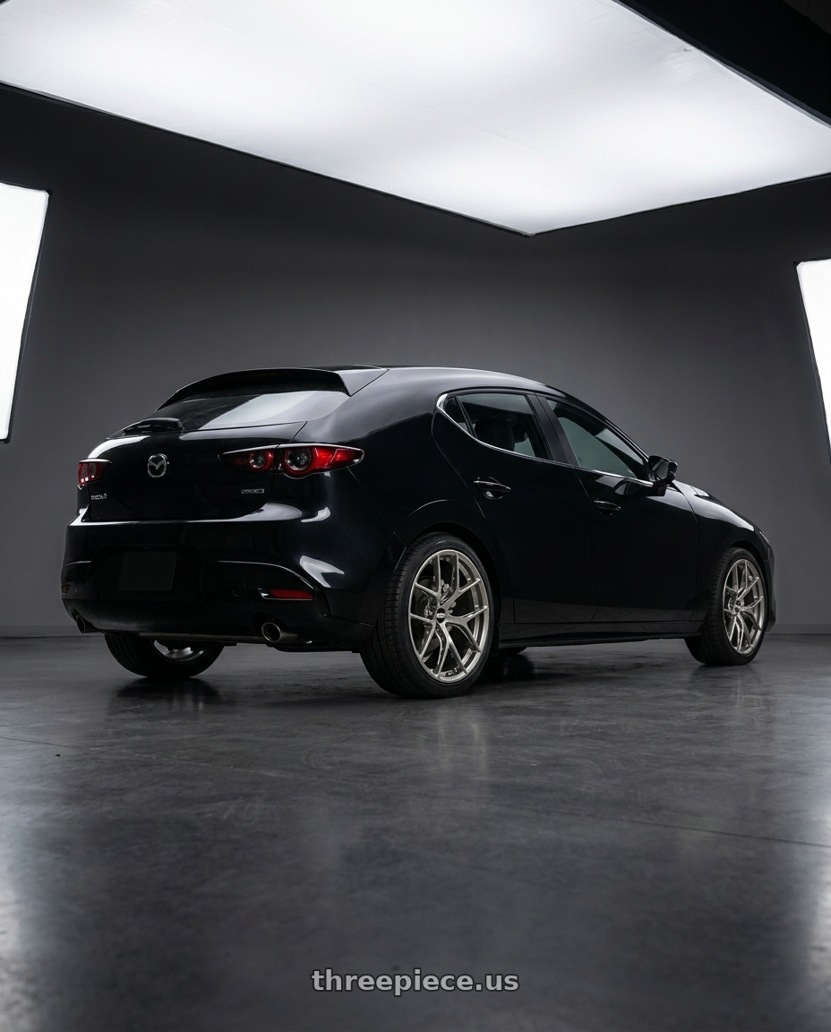 2026 mazda 3 with BBS FI-R Evo 5x112 19x9.5+15 Platinum Silver wheels rear three quarter view square tires