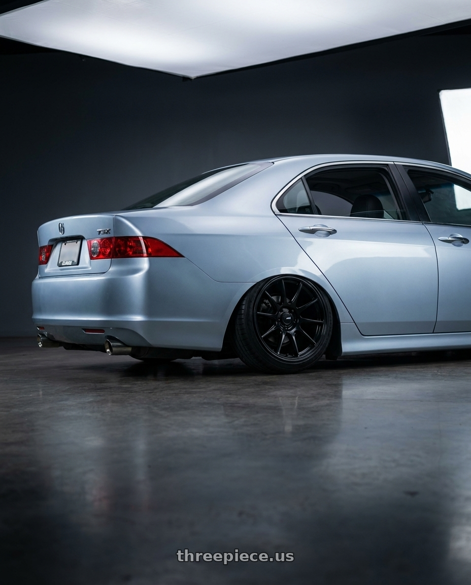 2005 Acura Tsx with Enkei TS10 5x114.3 17x8+35 Black wheels rear three quarter view slight stretch tires