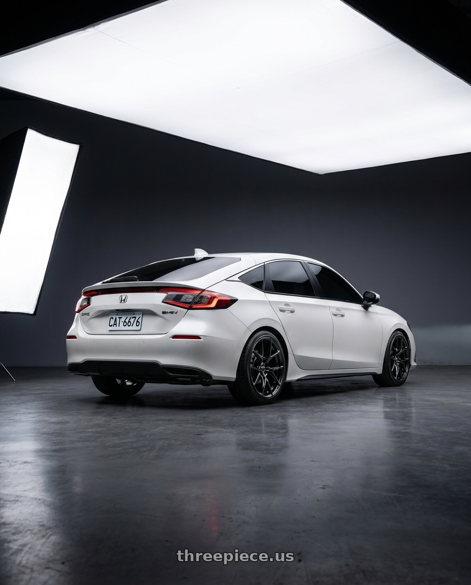 2025 Honda Civic e:HEV with Versus VV21S 18X9.5 +38 5-114.3 Jet Black - WT2X38EYNJ wheels rear three quarter view slight stretch tires