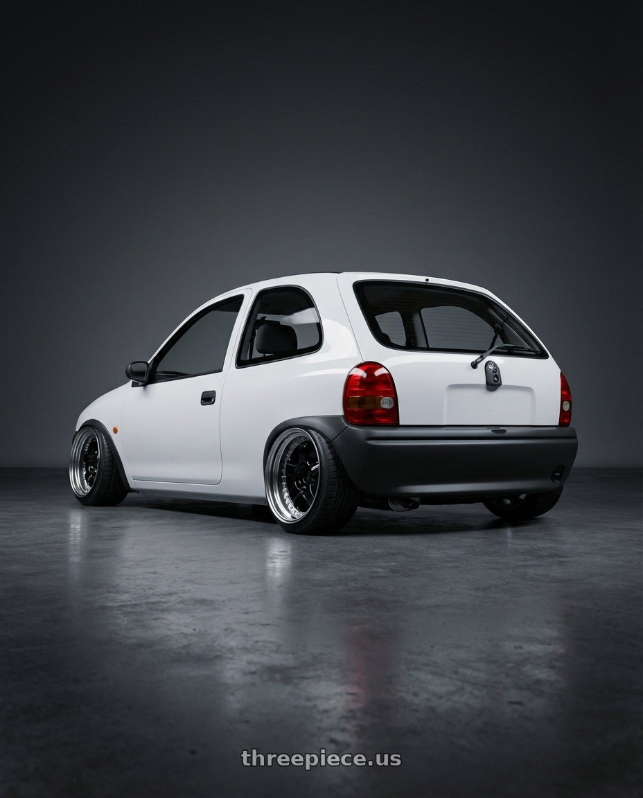 1994 Holden barina  with Work Meister S1 3P 5x100 18x9.5+54 A Disk Black wheels rear three quarter view extreme stretch tires