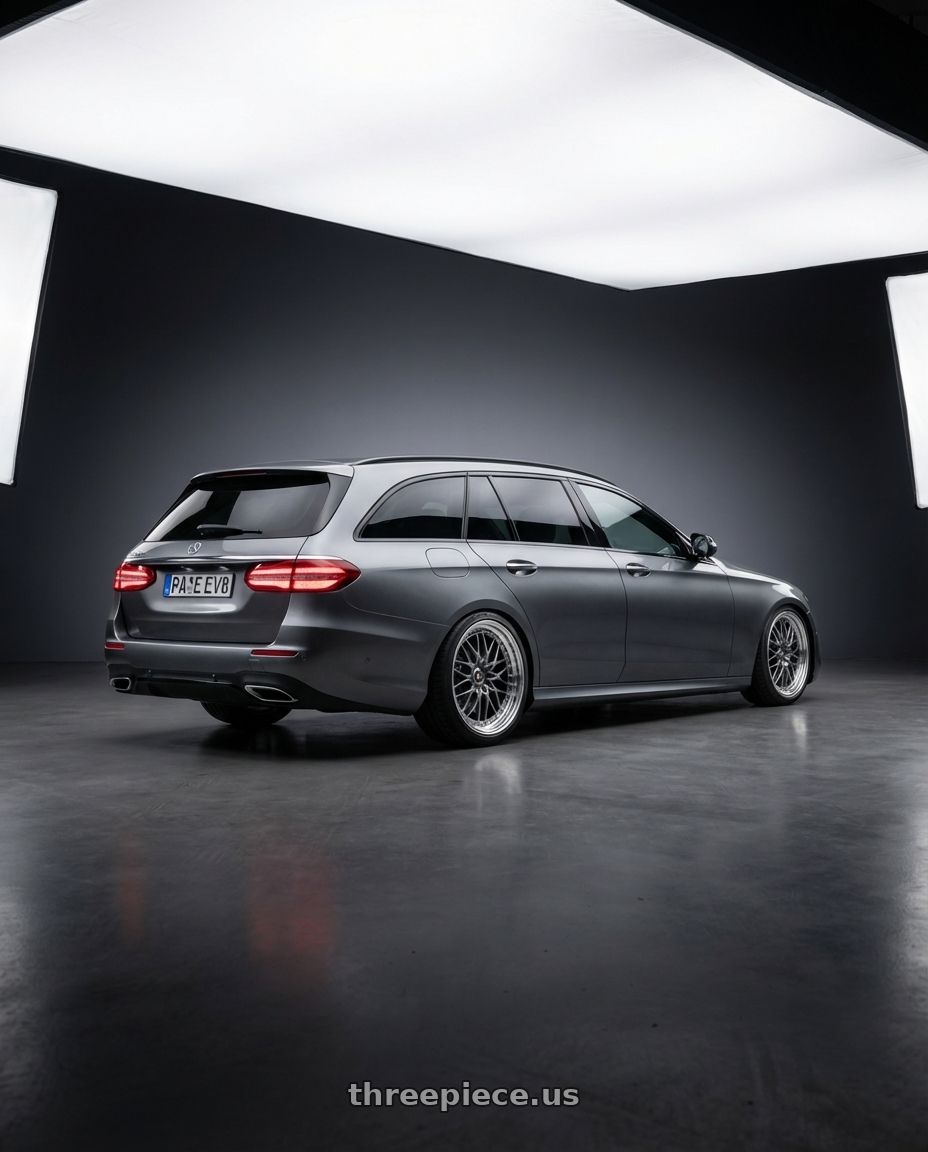 Mercedes benz e300de wagon  year 2020 with Work Vs-Xv 5x100 18x7+15 A Disk Brilliant Silver Black wheels rear three quarter view square tires