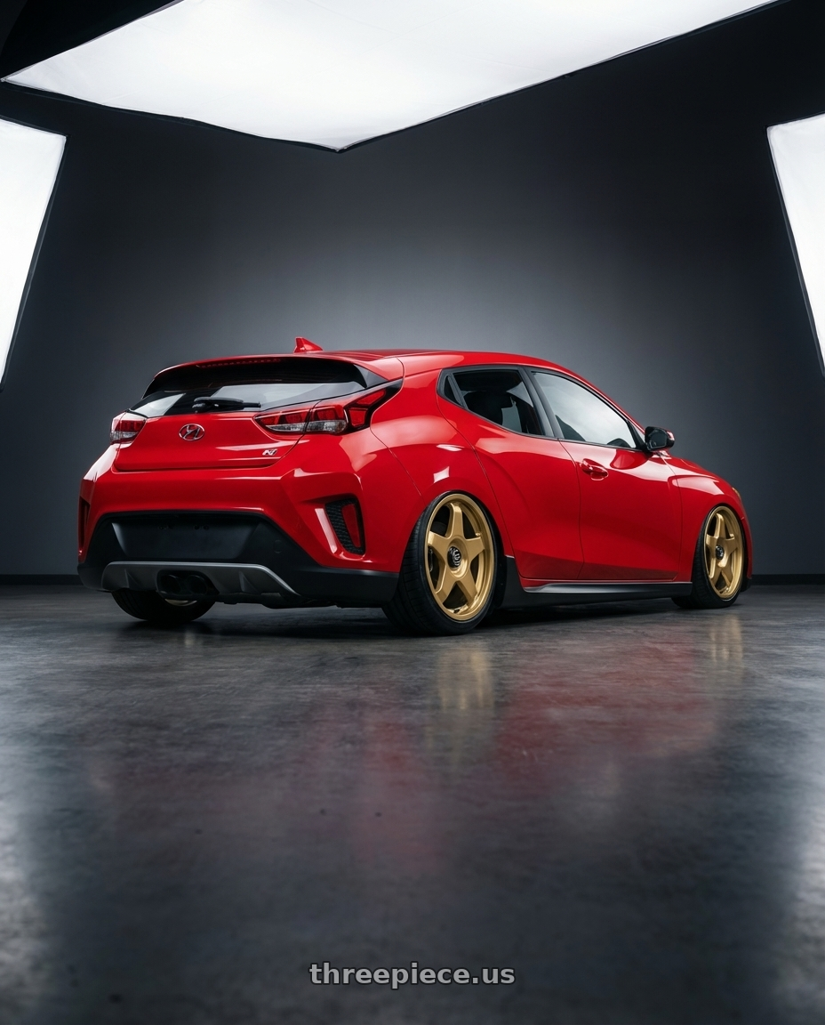 2022 Hyundai Veloster N with fifteen52 CHICANE 5x114.3 / 5x120 19x8.5 +35 GOLD (GLOSS GOLD) wheels rear three quarter view slight stretch tires